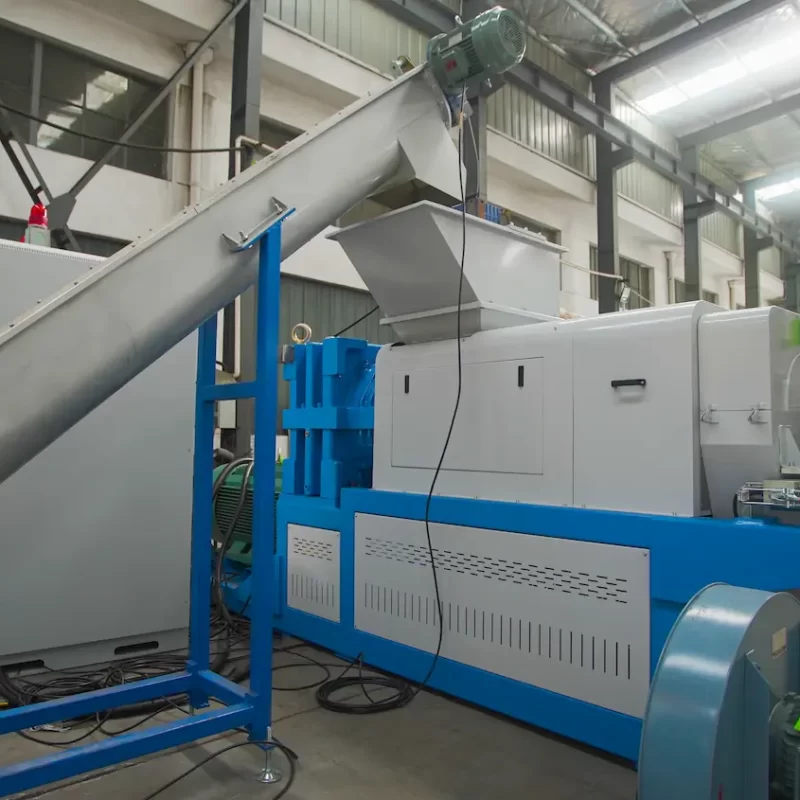 a Squeezing Machine used primarily in the plastic recycling process. This specific type of equipment is crucial for mechanically dewatering or drying washed plastic flakes or films. By squeezing out moisture, the machine significantly reduces the drying time and energy consumption required before the plastic can be further processed into pellets.