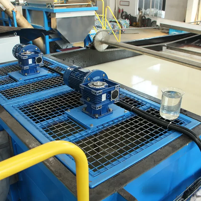 a Dissolved Air Flotation (DAF) unit, a technology widely used in water treatment processes, especially in industrial settings. This unit is crucial for removing suspended solids, oils, and other contaminants from wastewater. The DAF system operates by dissolving air under pressure and then releasing it at atmospheric pressure in a flotation tank basin. The released air forms tiny bubbles that attach to the contaminants causing them to float to the surface from where they can be removed. In the image, you can see the flotation tank filled with water, and multiple blue motorized units that likely drive the system’s pumps or air compressors. This equipment is essential in settings where water purity is critical, such as in recycling facilities for cleaning process water or in industries that discharge wastewater and must meet environmental regulations. The blue and yellow coloration of the equipment enhances visibility and safety, while the mesh guards protect the moving parts and the operators.