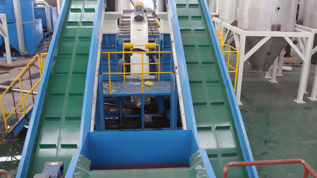 Industrial conveyor belt machinery in a factory.